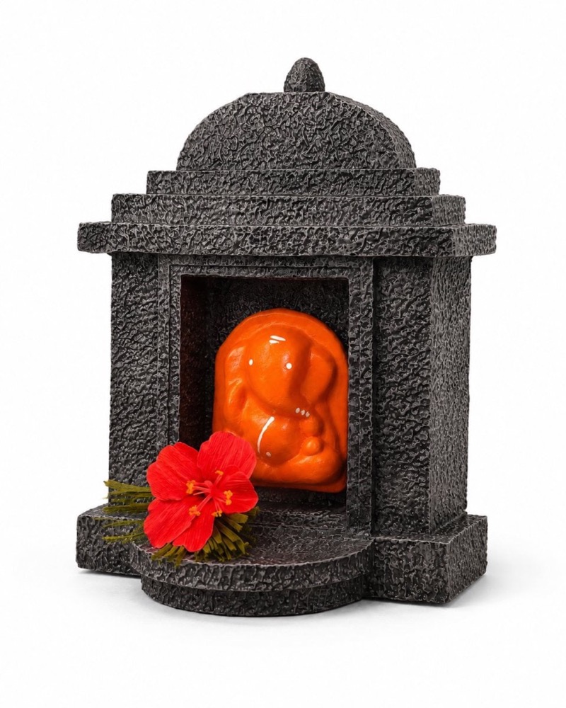 Three quarter view of the stone-finish fibreglass temple against a plain background.