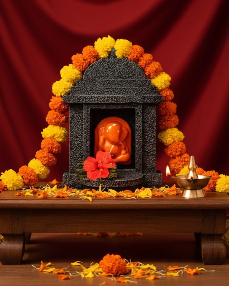 The shrine with a marigold garland.